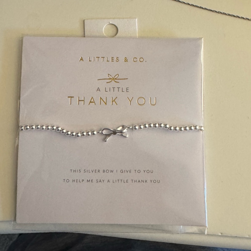 Silver Beaded Bracelet with Charm